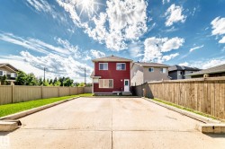 Expansive concrete pad, ideal for parking or outdoor activities - 
