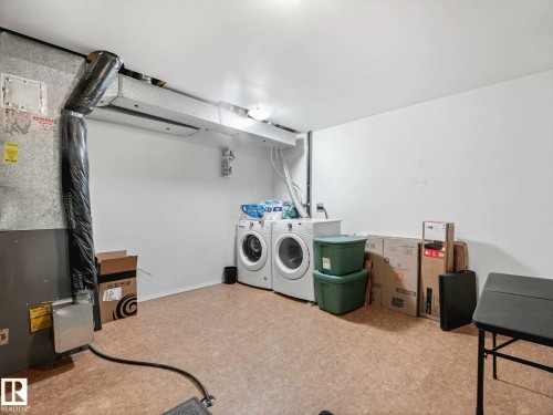 Image quality insufficient for description - 62 3075 Trelle Crescent Nw, Edmonton, AB - Indoor Photo Showing Laundry Room