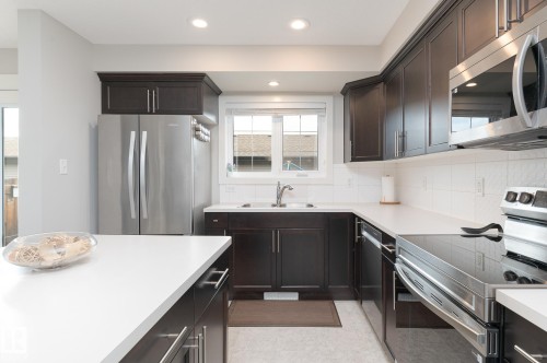 54 Tonewood Boulevard, Spruce Grove, AB - Indoor Photo Showing Kitchen With Double Sink
