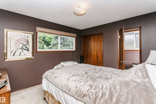 Room featuring neutral wall color, white ceiling, and a light-colored carpet - 14231 80 Street, Edmonton, AB 