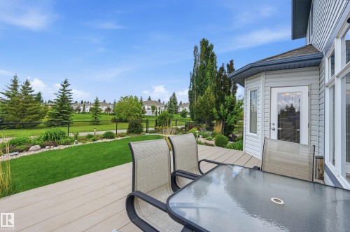 Expansive outdoor deck area featuring a light-toned composite surface - 7460 Singer Landing, Edmonton, AB 