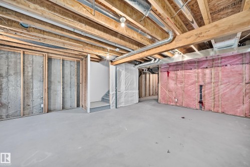 Unfinished basement offering expansive concrete flooring and exposed wooden joists - 2433 Glenridding Boulevard, Edmonton, AB 