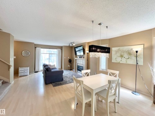 8 4755 Terwillegar Common, Edmonton, AB - Indoor With Fireplace