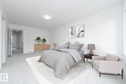 Bright interior featuring light gray carpeting, white walls, a flush-mount ceiling light, and a window for natural illumination - 