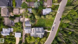 Aerial perspective showcasing a residential neighborhood with varied property sizes - 