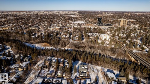 Expansive aerial perspective showcasing a residential area with varied architectural styles - 14307 Summit Drive, Edmonton, AB 
