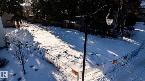 Cleared lot with perimeter fencing - 14307 Summit Drive, Edmonton, AB 