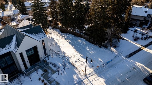 Vacant land parcel featuring a flat topography and established perimeter fencing - 14307 Summit Drive, Edmonton, AB 