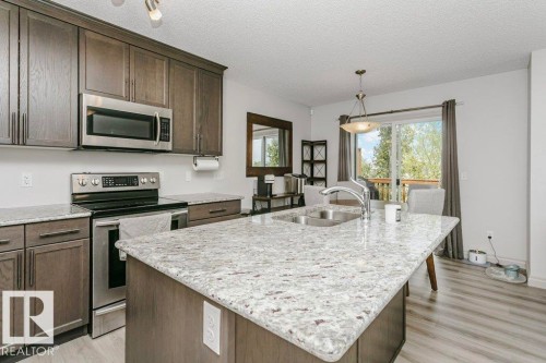 30 445 Brintnell Boulevard, Edmonton, AB - Indoor Photo Showing Kitchen With Stainless Steel Kitchen With Double Sink With Upgraded Kitchen