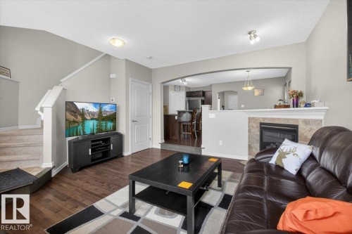 1107 35 Avenue, Edmonton, AB - Indoor Photo Showing Living Room With Fireplace