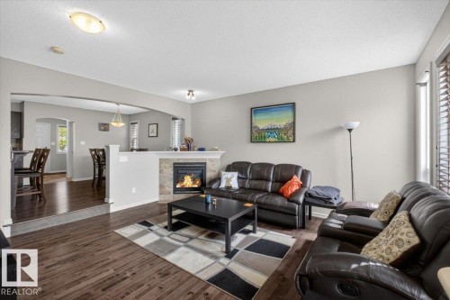 1107 35 Avenue, Edmonton, AB - Indoor Photo Showing Living Room With Fireplace