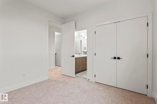 Soft carpeting and recessed lighting - 13111 187 Avenue Nw, Edmonton, AB - Indoor Photo Showing Other Room