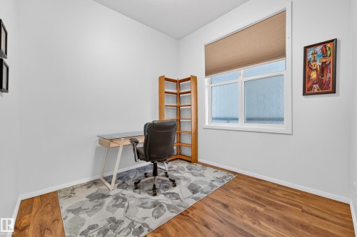Bright room with wood-finish flooring - 410 10531 117 Street, Edmonton, AB 