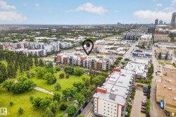 Aerial perspective highlighting a multi-story residential building - 