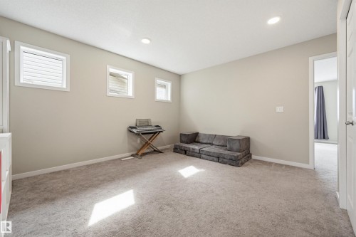 Carpeted room with neutral wall tones and recessed lighting - 56 Springbrook Wynd, Spruce Grove, AB - Indoor