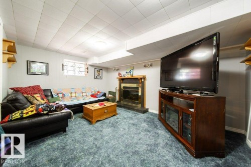 Complete with wood burning Fireplace - 4823 10 Avenue, Edmonton, AB 