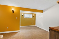 Room featuring cork-look flooring and recessed ceiling lighting - 