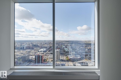 Expansive window offering broad city and sky panoramas - #3901 10360 102 St Nw Nw, Edmonton, AB - Indoor Photo Showing Other Room