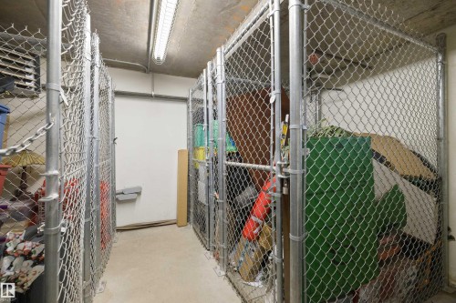 Dedicated storage units featuring chain-link construction and concrete flooring - #206 10232 115 St Nw, Edmonton, AB 