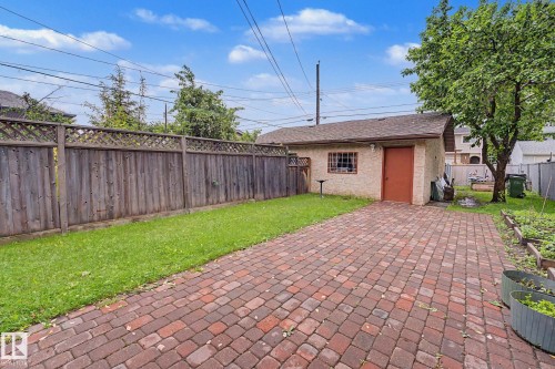 Detached garage with a shingled roof and stucco exterior - 10242 161 Street, Edmonton, AB 