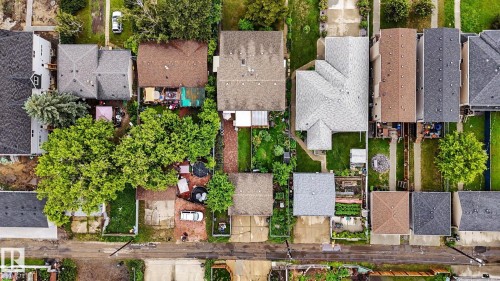 Aerial perspective showcasing multiple properties with varied rooflines and established landscaping - 10242 161 Street, Edmonton, AB 