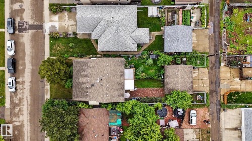Aerial perspective showcasing multiple properties with varied roofing materials - 10242 161 Street, Edmonton, AB 