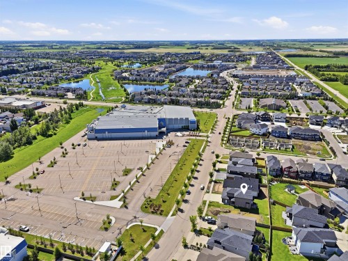 Aerial perspective showcasing a residential area with varied housing styles - 5110 Rue Eaglemont, Beaumont, AB 