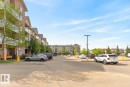 Contemporary multi-story building featuring balconies with glass railings - 320 5005 165 Avenue, Edmonton, AB  - Outdoor 