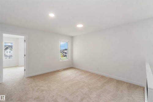 Carpeted room with recessed lighting and white walls - 19360 29 Avenue, Edmonton, AB 