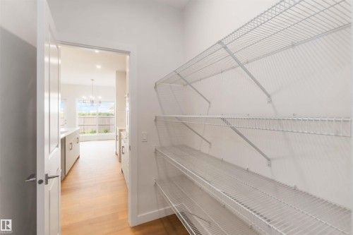 Pantry featuring multiple wire shelving units - 19360 29 Avenue, Edmonton, AB 