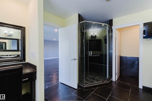 Black tile flooring spanning the space - 3438 West Landing Landing, Edmonton, AB 