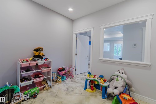 Recessed lighting illuminates neutral-toned walls - 3438 West Landing Landing, Edmonton, AB 