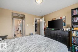 Interior room featuring neutral wall tones and a ceiling-mounted light fixture - 
