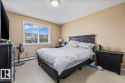 Neutral wall tones complement the light-colored carpeting - 