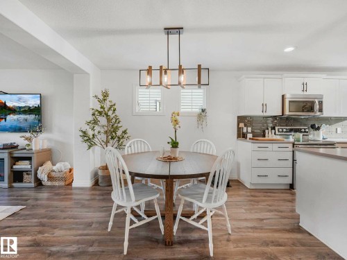 Open-concept dining area - 162 Kirpatrick Way, Leduc, AB 