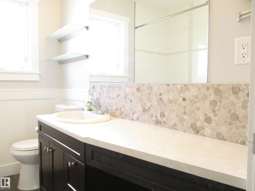 4pc with tub and shower located on the main floor - 10946 165 Street Nw, Edmonton, AB 