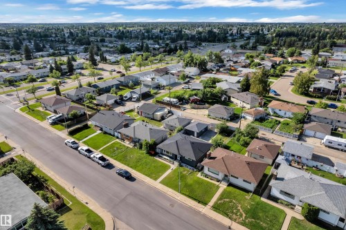 Established residential neighborhood featuring mature trees and a grid street pattern - 8104 135 Avenue, Edmonton, AB 