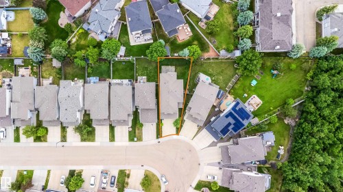 Aerial view of a residential property with a detached house situated on a cul-de-sac - 11312 13 Ave Sw, Edmonton, AB 