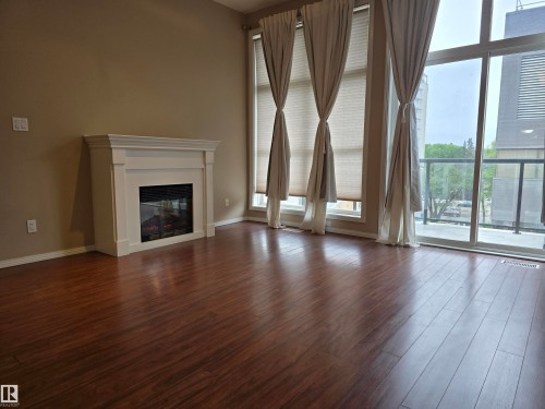 Edmonton, AB - Indoor Photo Showing Living Room With Fireplace