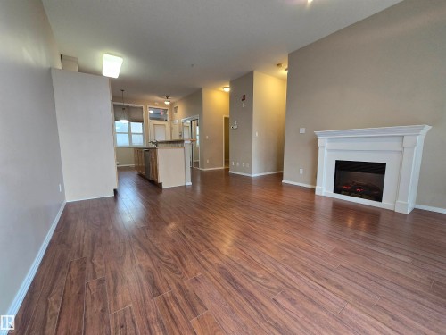 Edmonton, AB - Indoor Photo Showing Living Room With Fireplace