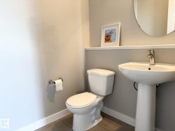 Pedestal sink with chrome faucet - 