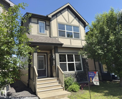 Two-story residence featuring a combination of stucco and siding - 3110 Paisley Road, Edmonton, AB 
