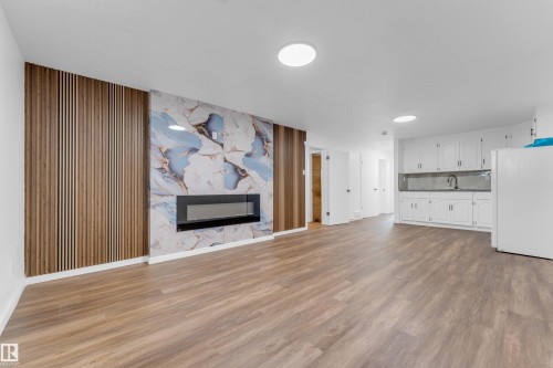 13116 128A Avenue, Edmonton, AB - Indoor Photo Showing Living Room With Fireplace