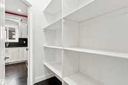 Built-in shelving with multiple storage levels, providing ample organization options - 
