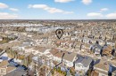 Aerial view of property and surrounding area featuring nearby suburban area - 1660 Malone Way, Edmonton, AB 
