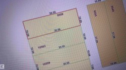 Property Survey. Displaying parcel dimensions and identification numbers for the property - 