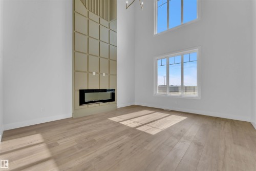 3503 42 Avenue, Beaumont, AB - Indoor Photo Showing Other Room With Fireplace
