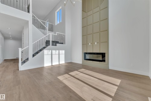 3503 42 Avenue, Beaumont, AB - Indoor Photo Showing Other Room With Fireplace