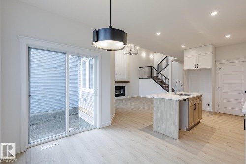 Sliding glass patio door opening to the exterior - 6308 65 Avenue, Beaumont, AB 