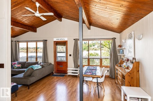 Vaulted wood-paneled ceiling with exposed beams - 27 Point Drive, Rural St. Paul County, AB - Indoor